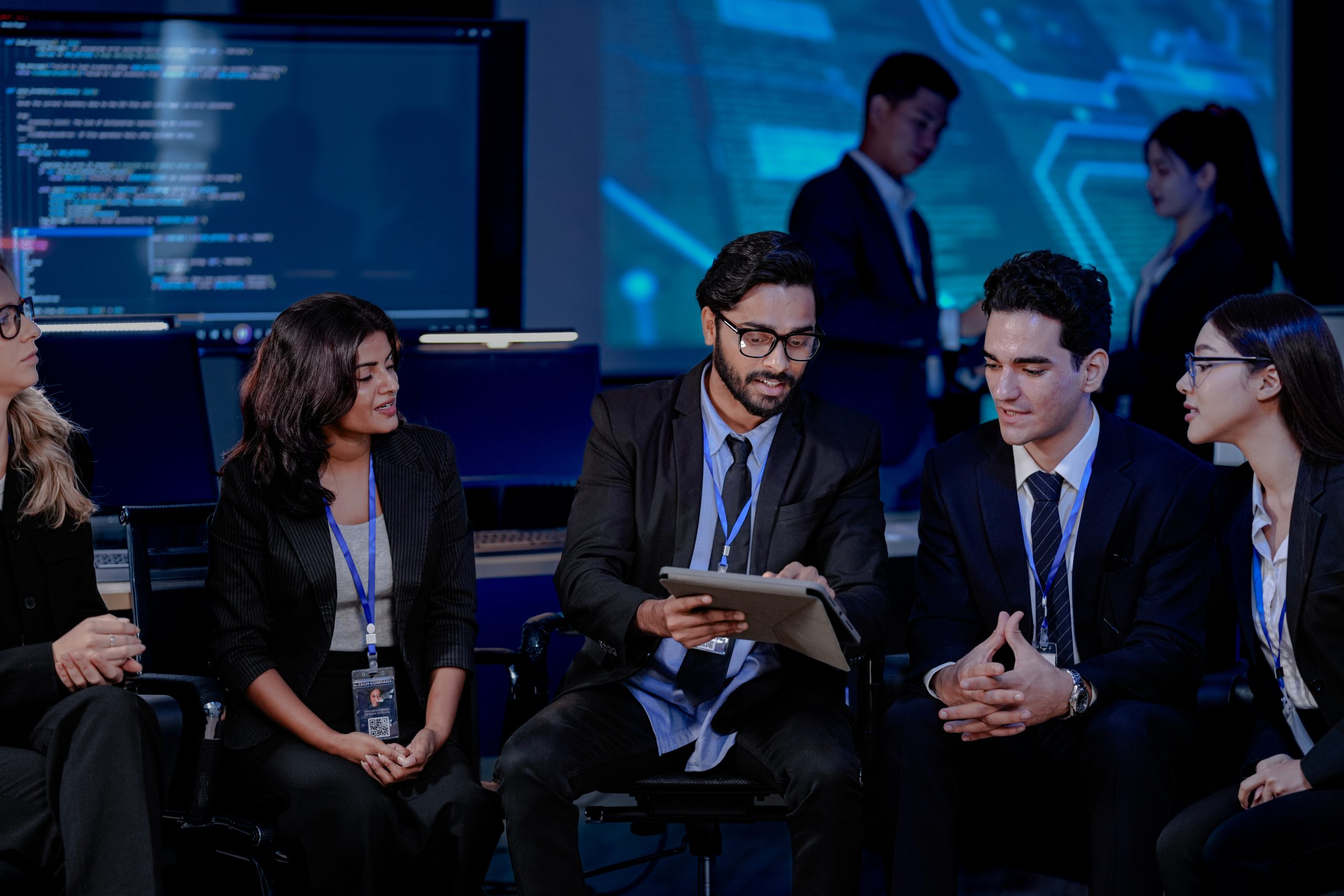 Security professionals reviewing technology operations